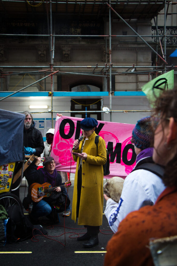 Caroline Lucas gives a speech at a climate protest