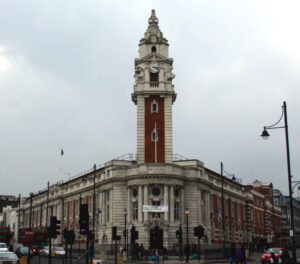An external image of Lambeth Council Town Hall, a wide building with both red and white brick.