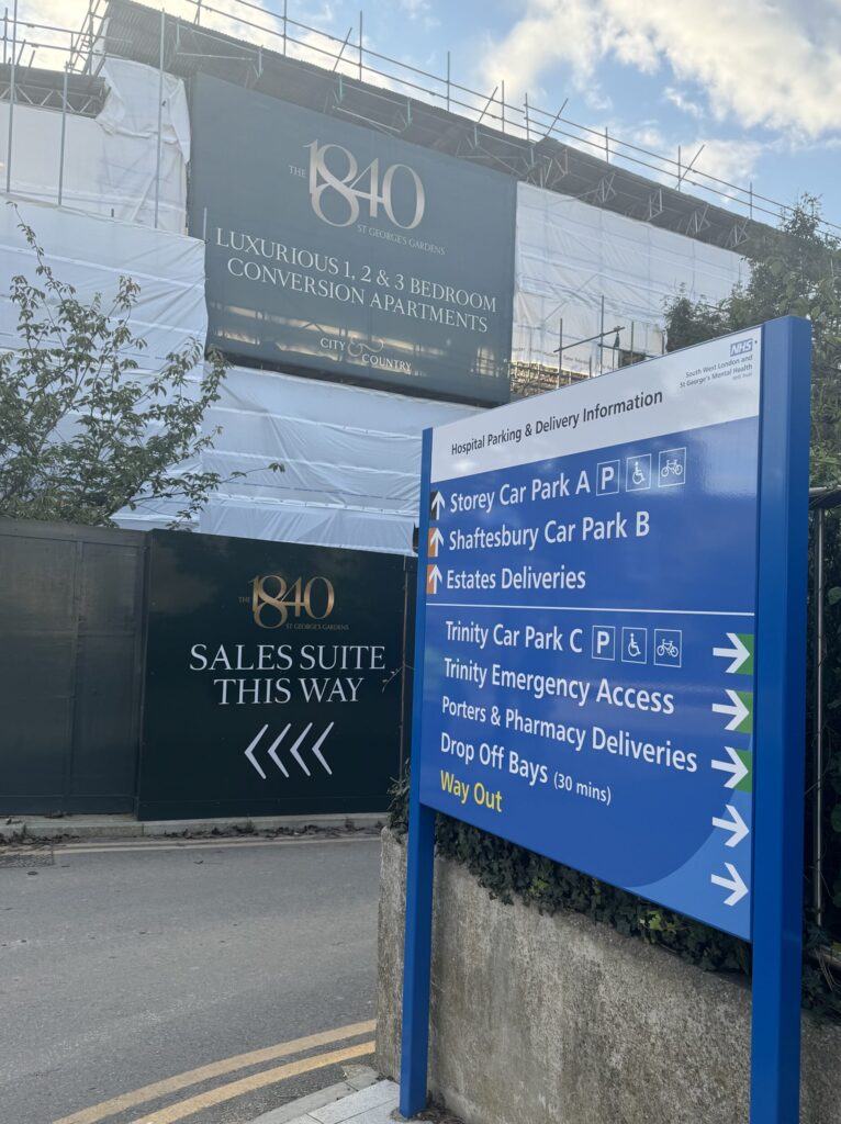 NHS sign under housing Construction 