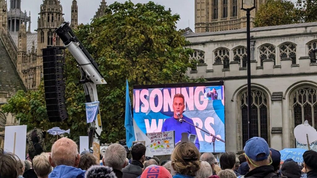 Chris Packman addresses thousands of protestors outside of the Houses of Parliament 