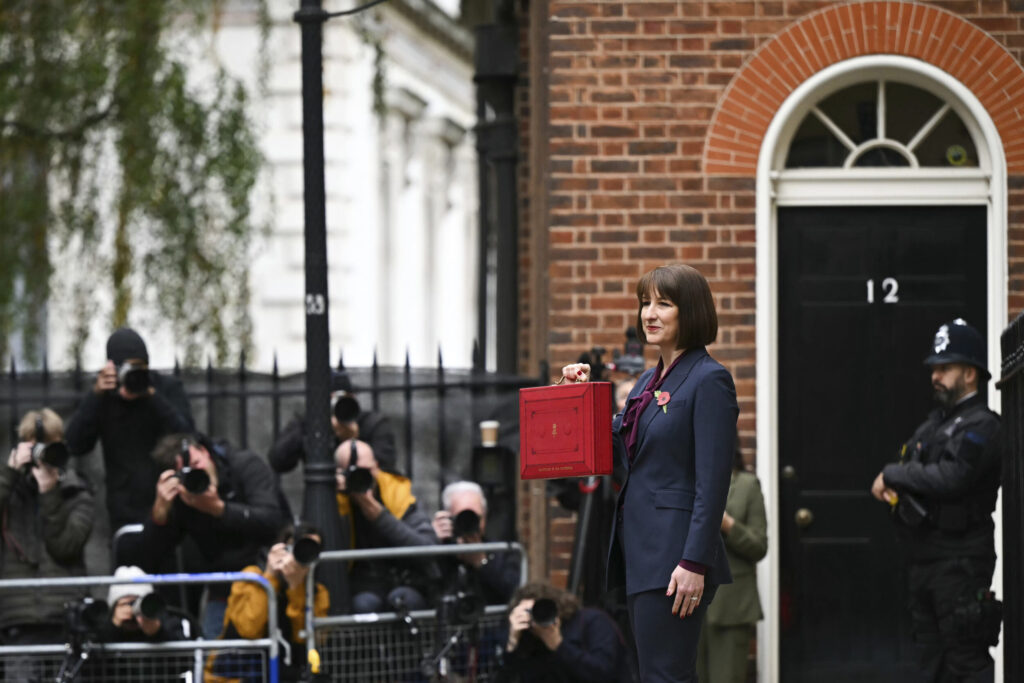 Chancellor of the Exchequer Rachel Reeves poses with the traditional red briefcase containing her budget speech at No 11 Downing Street.