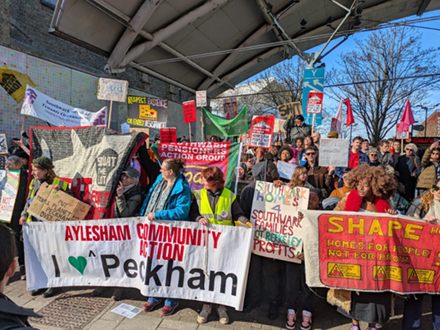Protesters holding signs for Aylesham Community Action