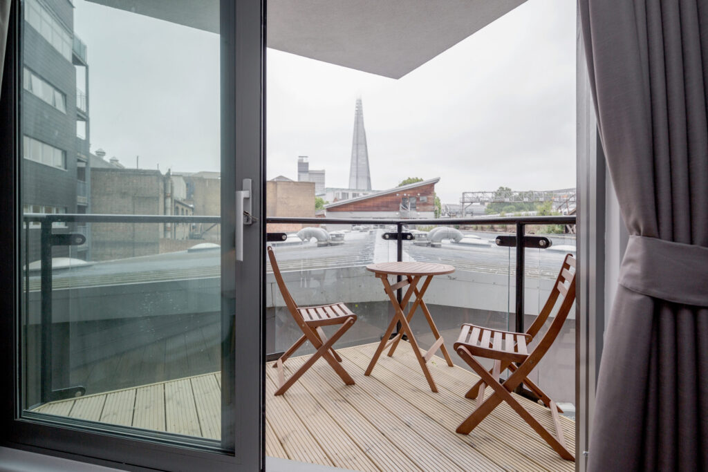 Flat terrace with view of the Shard, London.