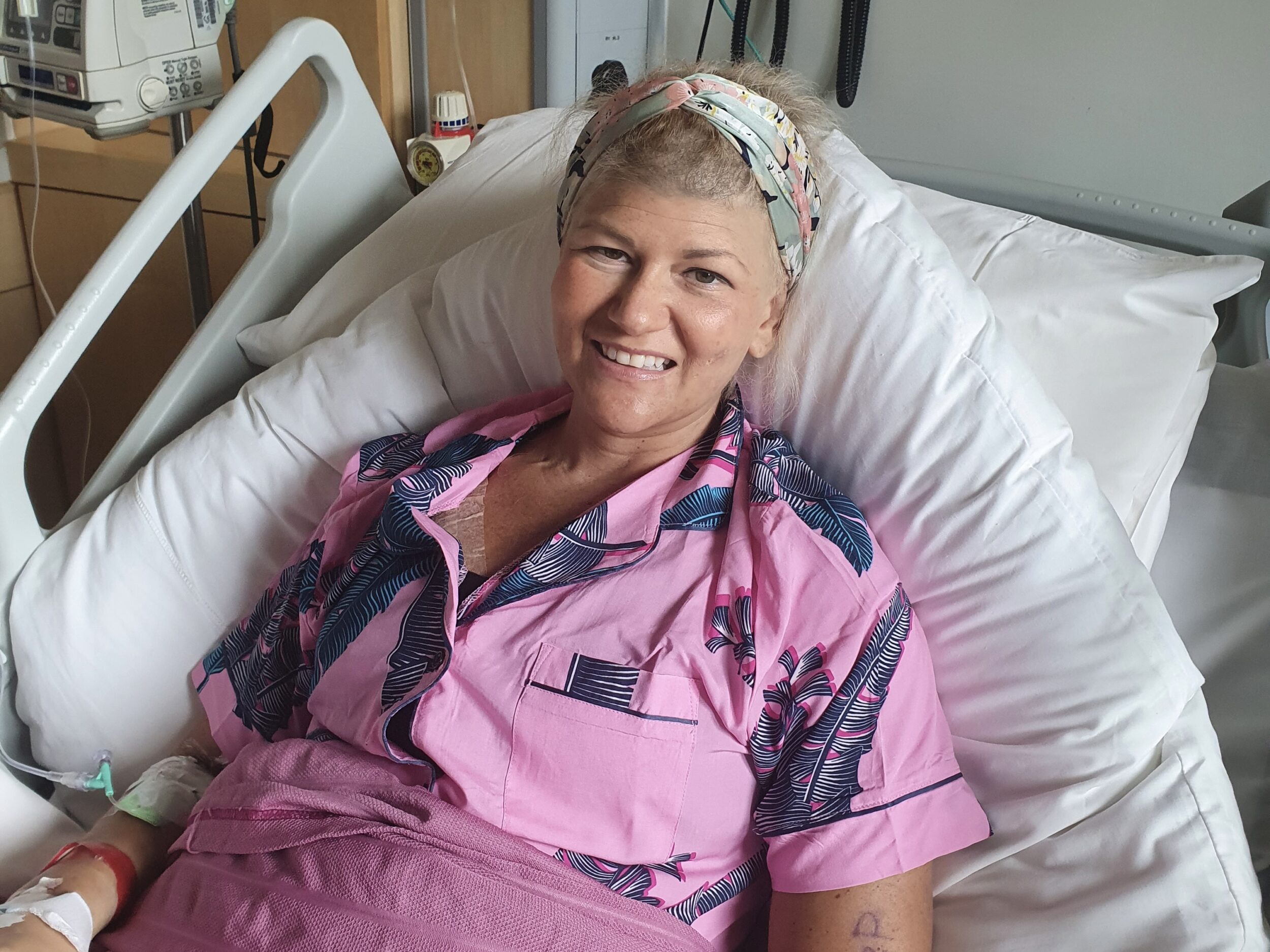 Carly Moosah is in a hospital bed