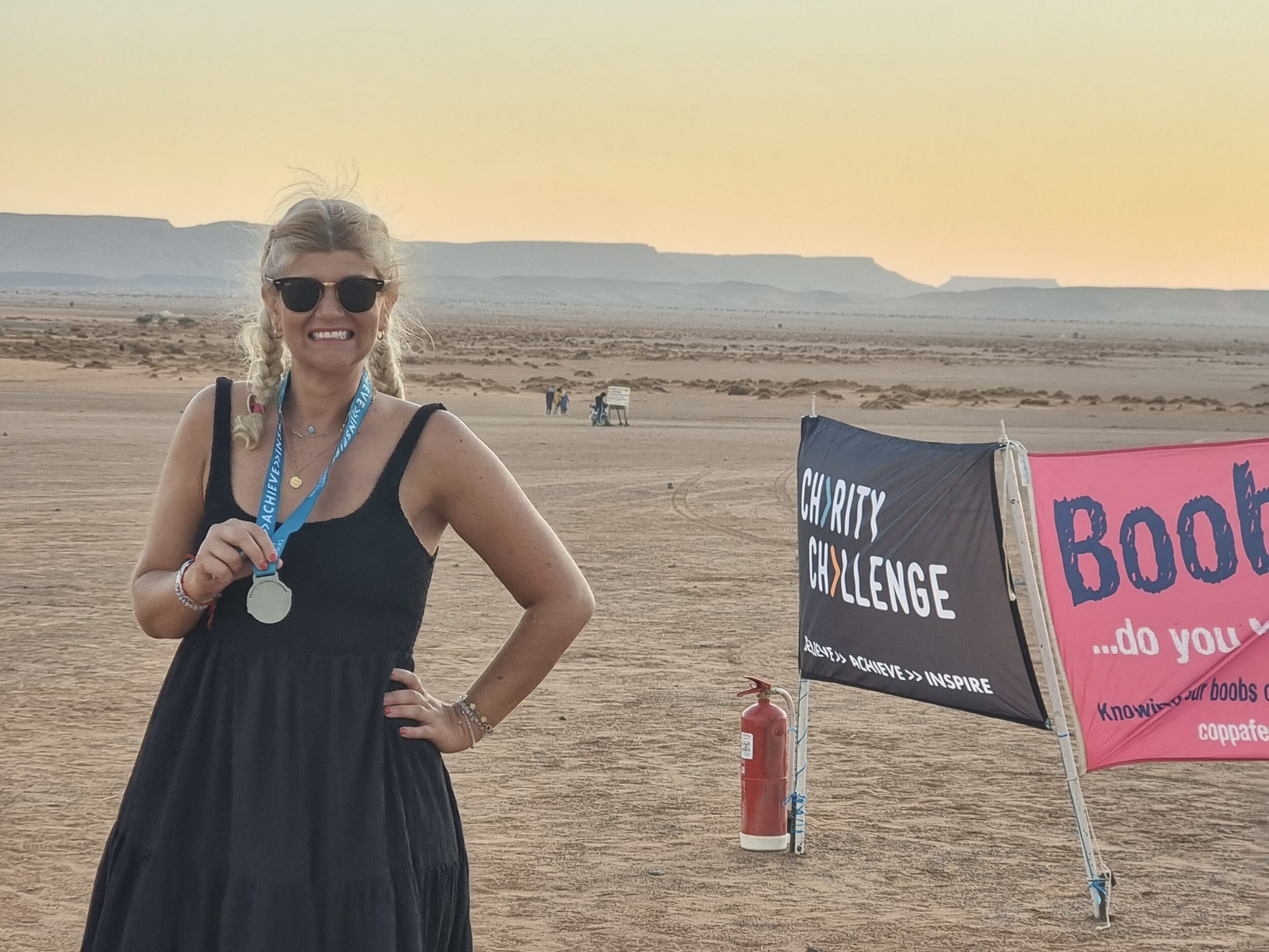 Carly Moosah at a charity event in the outdoors.