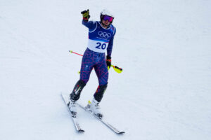 Britain's Dave Ryding arrives at the finish area of an alpine ski, men's slalom race, at the 2026 Winter Olympics, in Bormio, Italy, Monday, Feb. 16, 2026. (AP Photo/Julia Demaree Nikhinson)