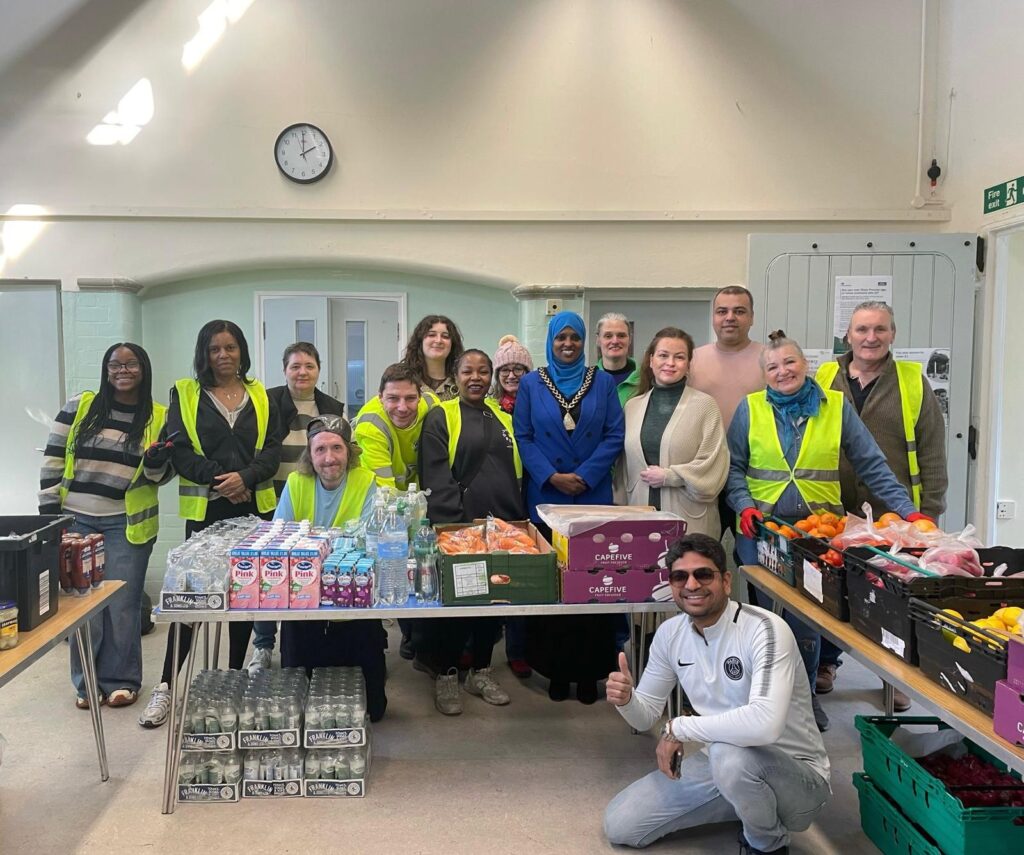Rotherhithe Community Kitchen volunteers pictured with their foodbank supplies 